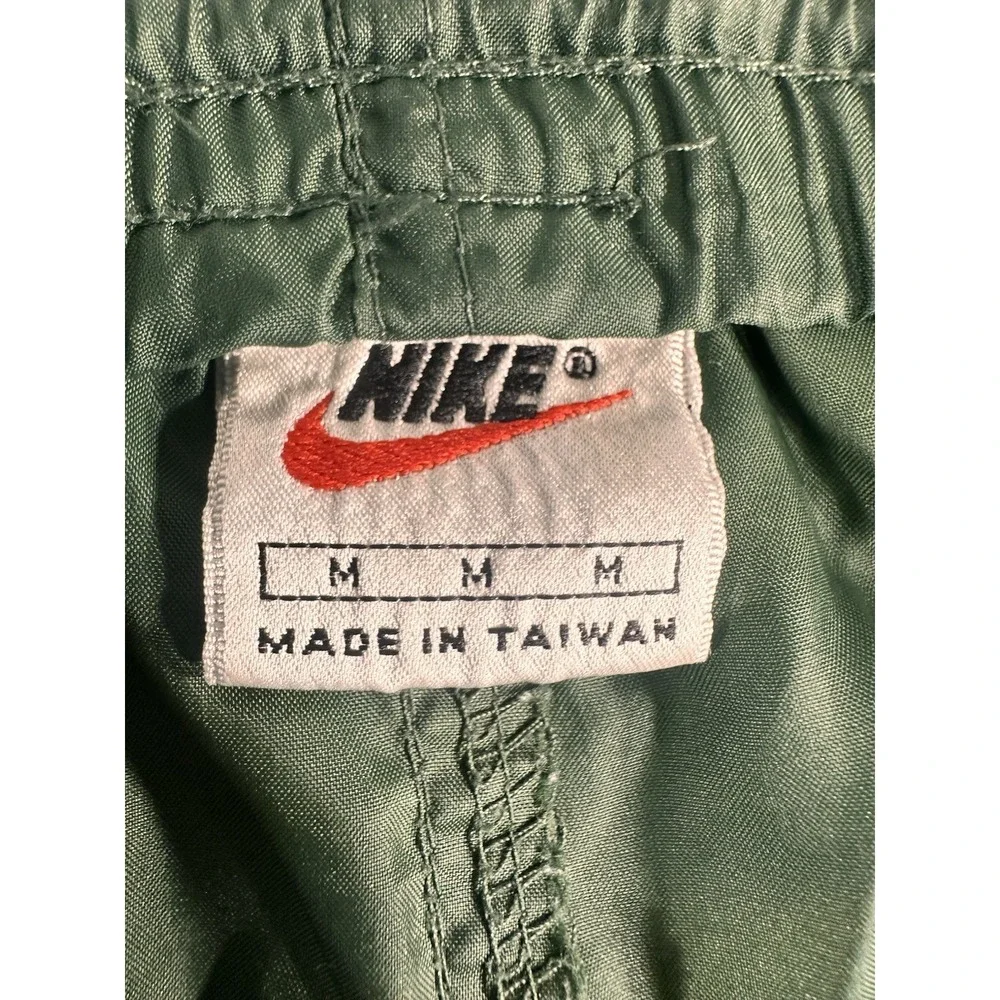 Nike Men's M Green Nylon Track Pants Drawstring Elastic Waist Zip Pockets Solid